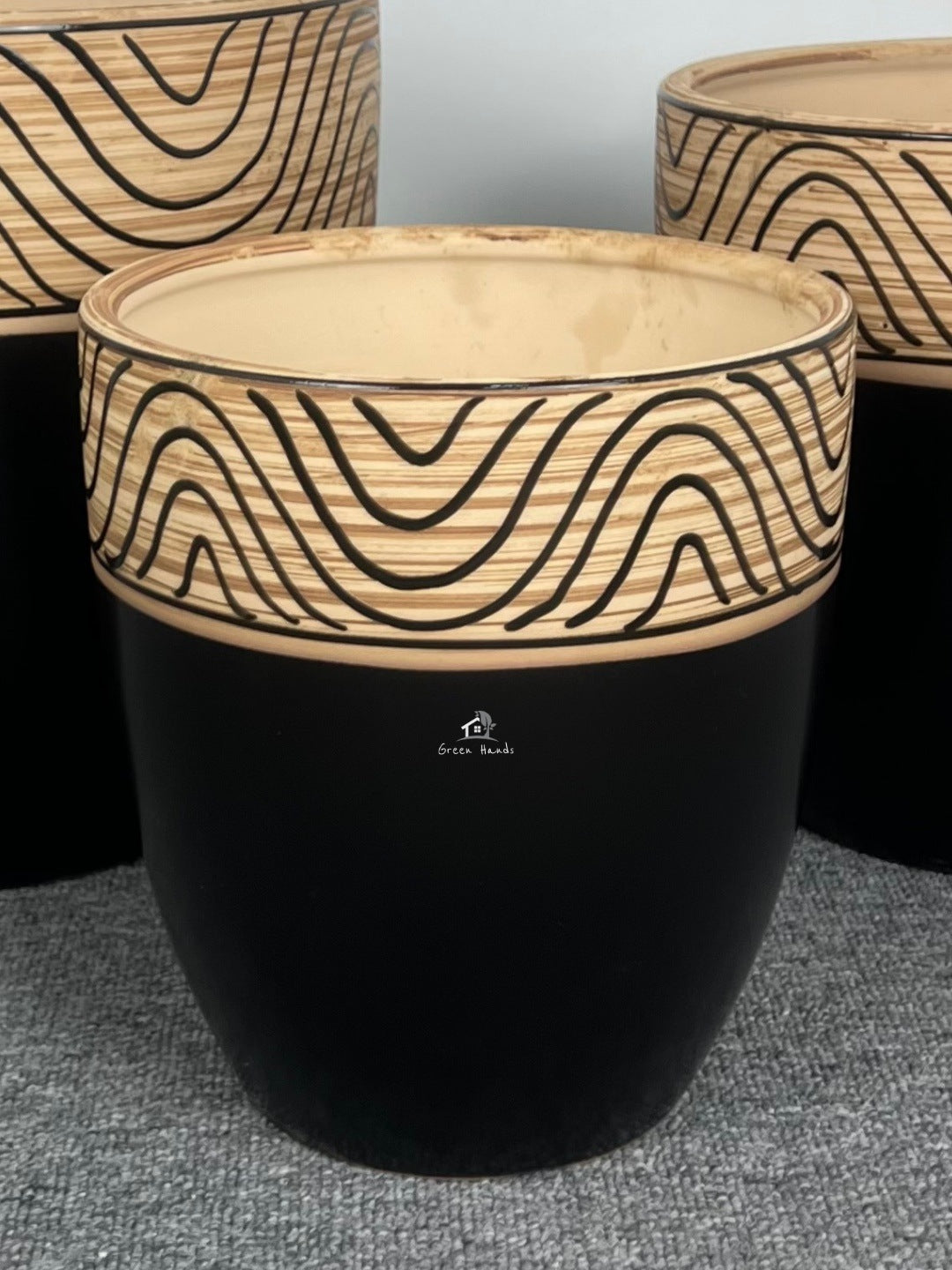 Artistic Black Ceramic Pots with Wooden Carving Finish in Dubai & Abu Dhabi: Natural Design with Drain Holes