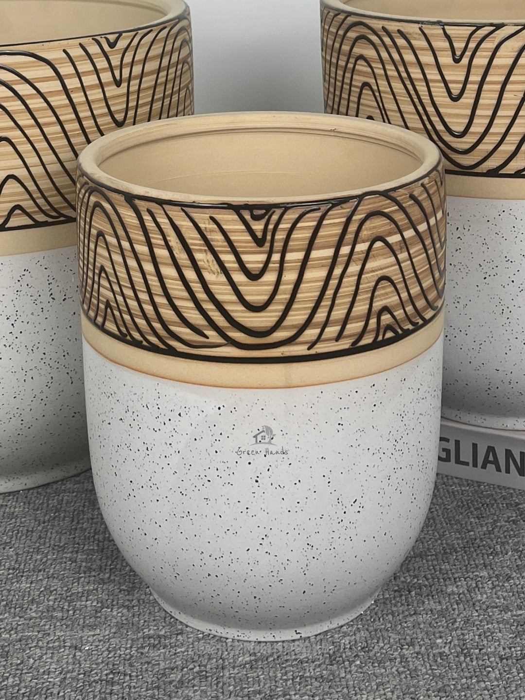 Nature Lover's White Ceramic Pots with Wooden Carving Finish in Dubai & Abu Dhabi: Minimalistic Artistry with Drain Holes and Base Plates