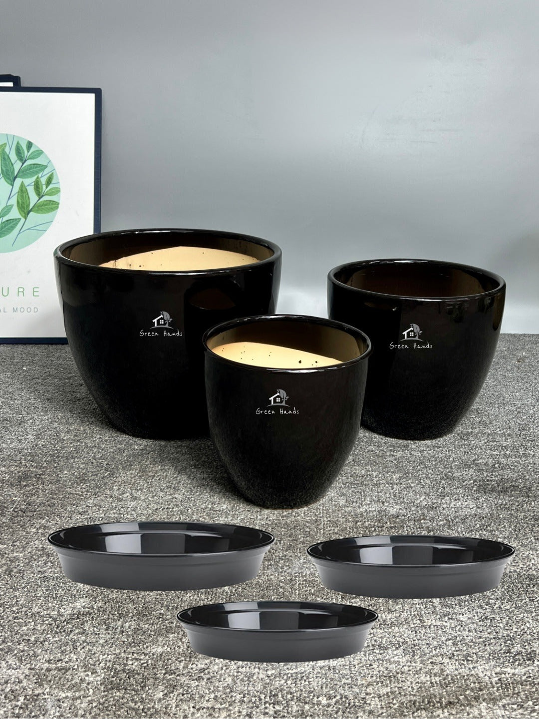 Sleek Black Ceramic Pots in Dubai & Abu Dhabi: Minimalistic Modern Design with Drain Holes with base plates